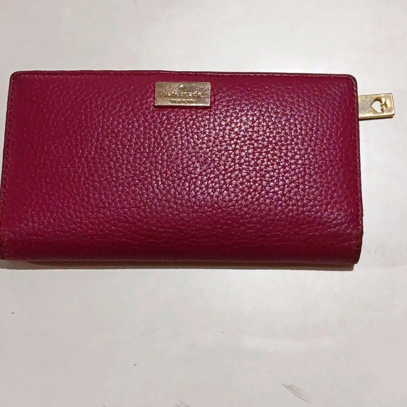 kate spade Handbags - EUC Kate Spade Darcy Pebbled Leather Bifold Wallet Maroon Signature Embossed